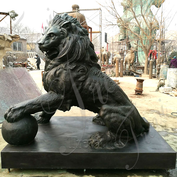Custom made bronze lion with paw on the ball outdoor garden statues for sale BOKK-540